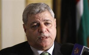 Jordan's Prime Minister Awn Shawkat Al-Khasawneh attends a news conference in Tripoli in this February 7, 2012 file photo. Khasawneh resigned on April 26, 2012, barely six months after he was asked to form a government in response to protests calling for faster political reforms in the kingdom. State television said King Abdullah accepted Khasawneh's resignation. REUTERS/Anis Mili/Files